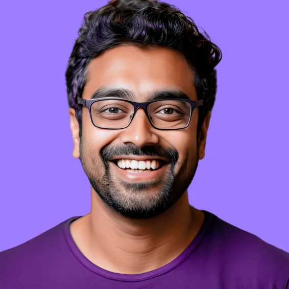 A man wearing glasses and a purple shirt.