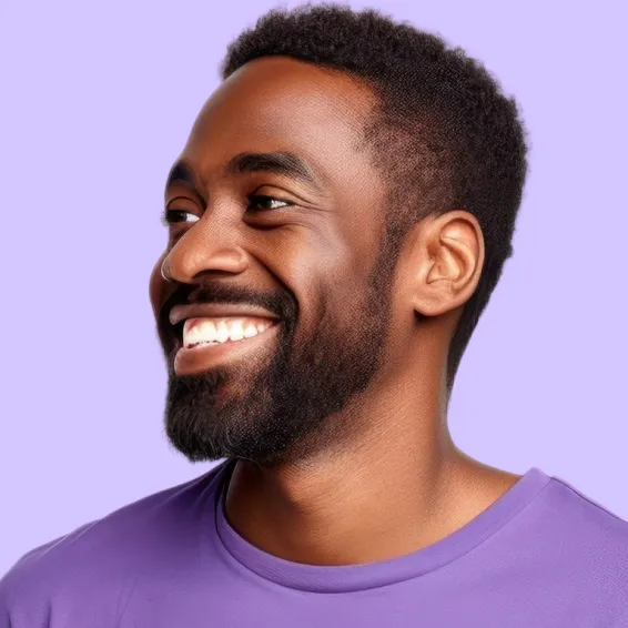 A close up of a person wearing a purple shirt.